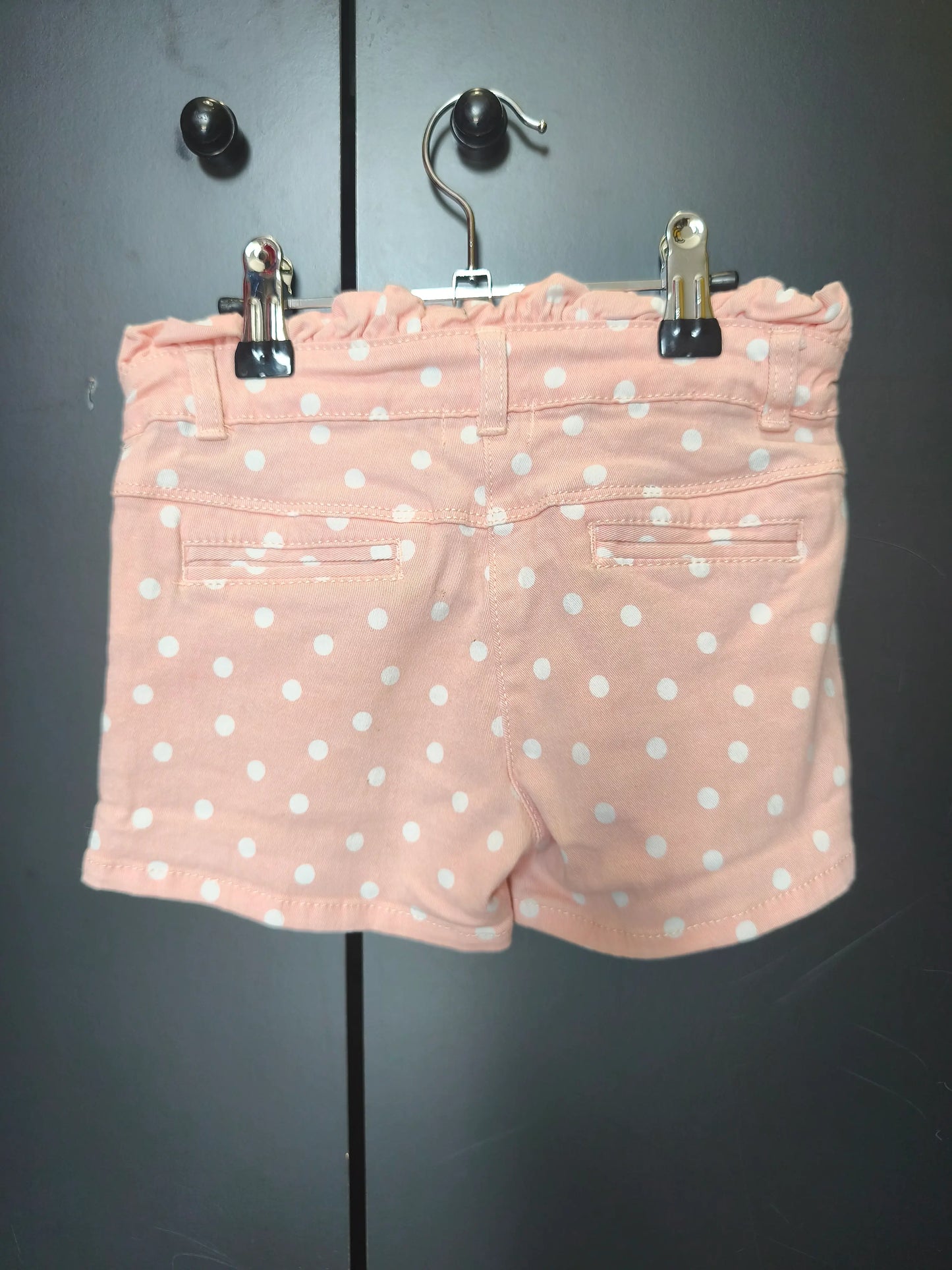 Short rose à pois blancs 6 ans Orchestra, volant à la taille, poches ref 96