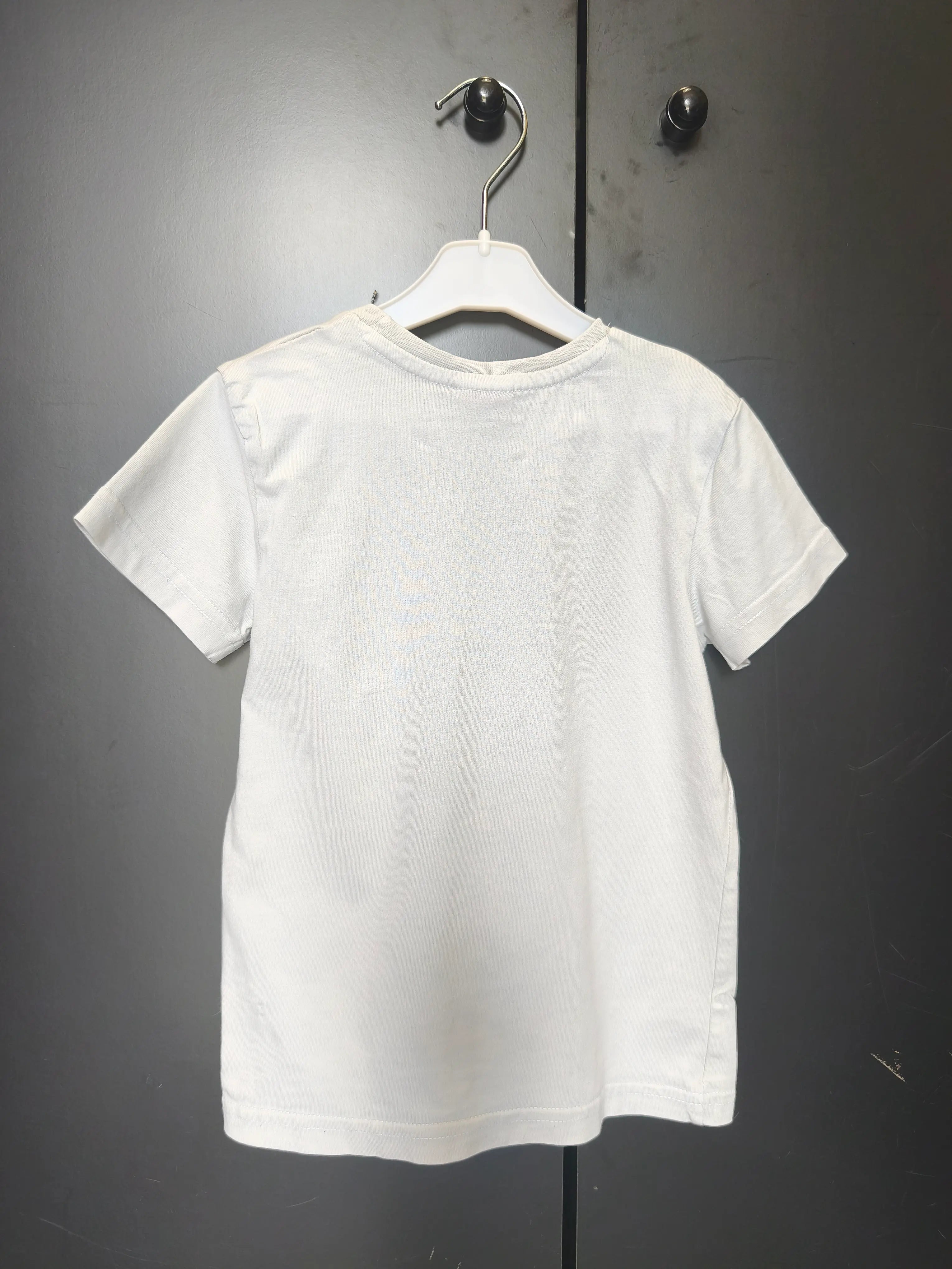 T-shirt enfant Tape à l’œil 4 ans - Bleu pastel uni avec poche cœur